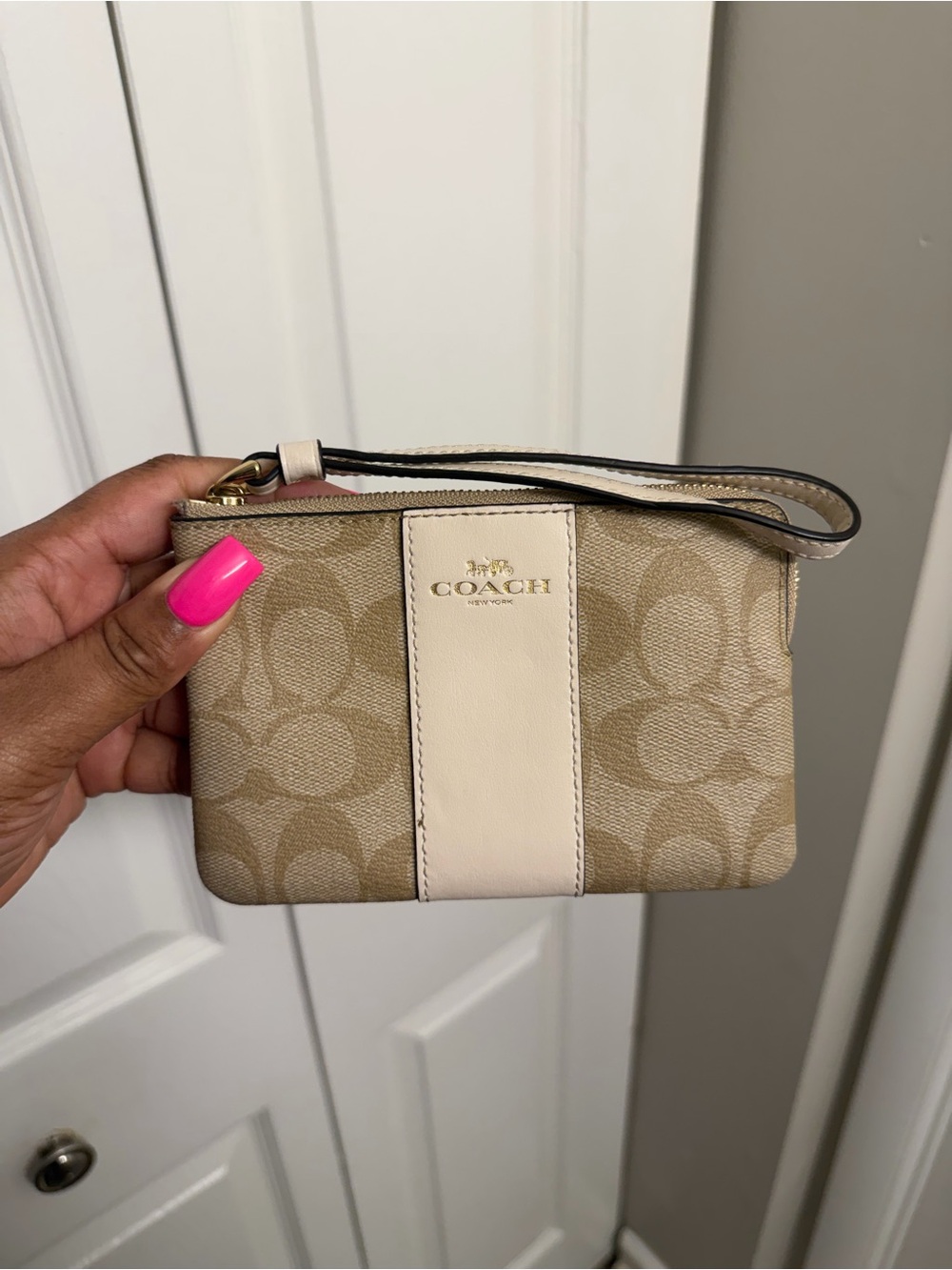 Coach Signature Canvas Wristlet in Beige and Cream with Gold Logo